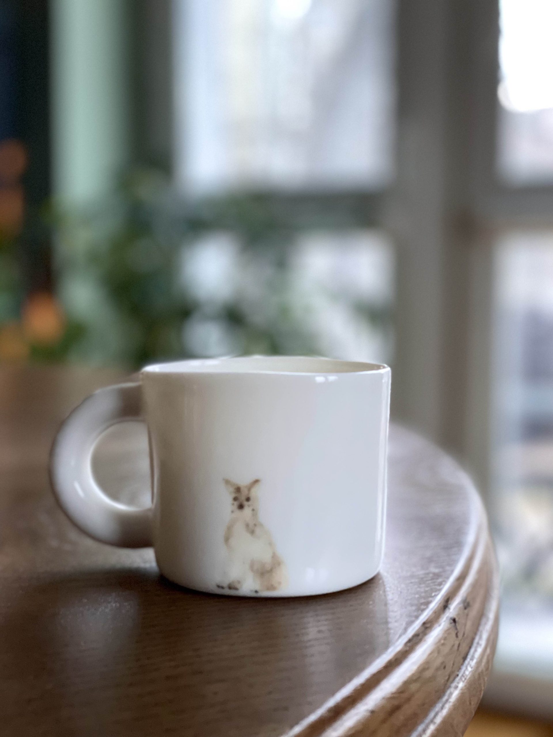 A mug with a dog, the mug has a capacity of 200 ml, the dog illustration is hand-painted